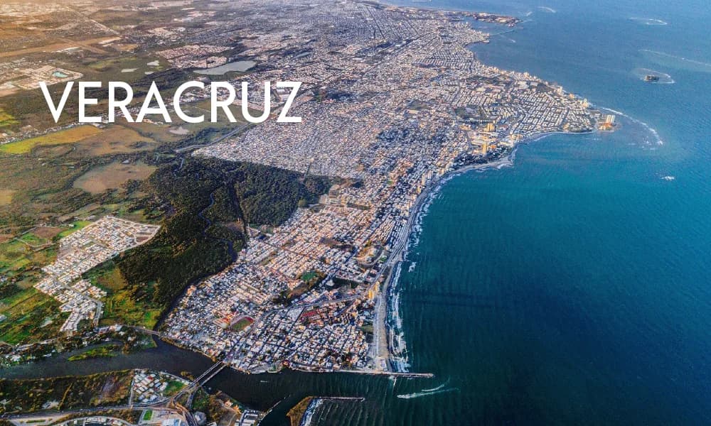 Aerial photograph of Veracruz, Mexico — historic Gulf-coast city seen from above, with 'VERACRUZ' overlay text on the left.