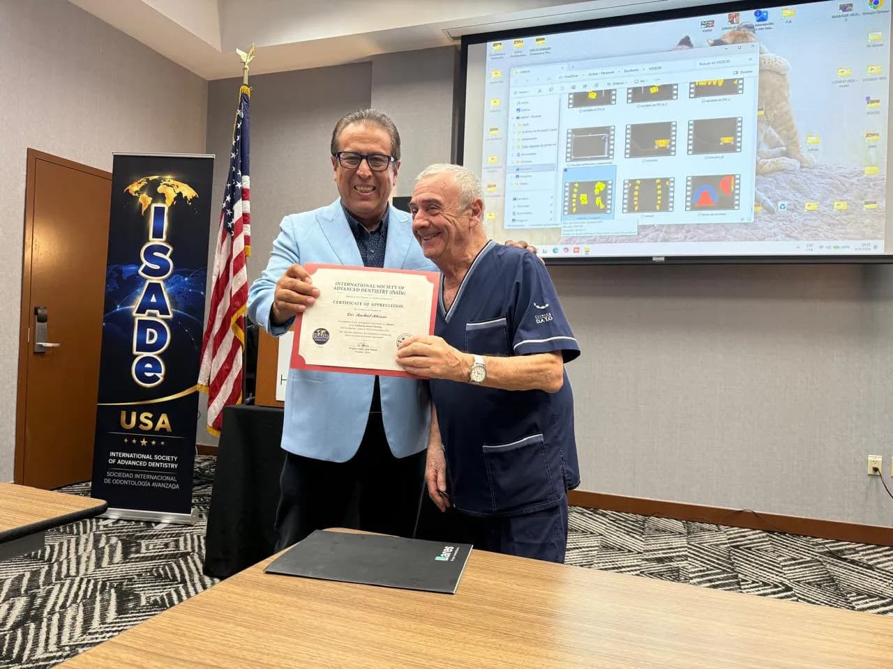 A speaker receiving an ISADe Certificate of Appreciation.